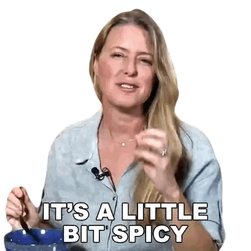 A Woman Says It 'S A Little Bit Spicy While Holding A Spoon In Her Hand Sticker