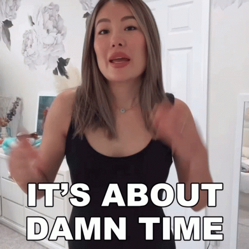 A Woman Says It 'S About Damn Time In Front Of A Dresser GIF