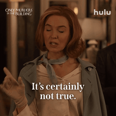 A Woman Says " It 'S Certainly Not True " In Front Of A Poster For Only Murders In The Building GIF