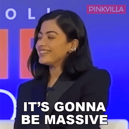 A Woman Says It 'S Gonna Be Massive In Front Of A Blue Background GIF