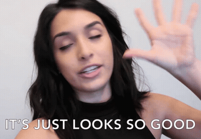 A Woman Says " It 'S Just Looks So Good " With Her Hand GIF