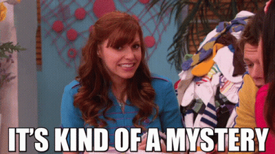 A Woman Says It 'S Kind Of A Mystery While Holding A Pile Of Socks GIF