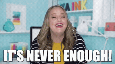 a woman says it 's never enough while laughing
