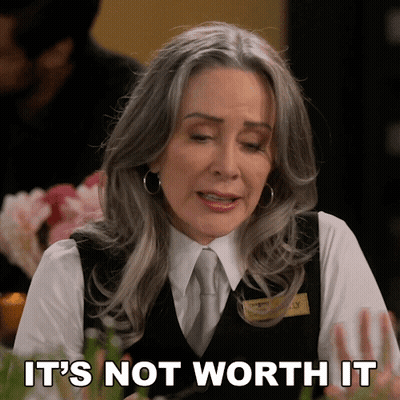 A Woman Says It 'S Not Worth It While Wearing A Vest And Tie GIF