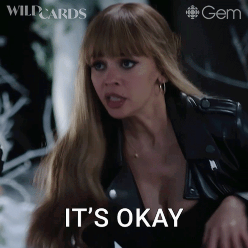A Woman Says It 'S Okay While Wearing A Black Jacket GIF