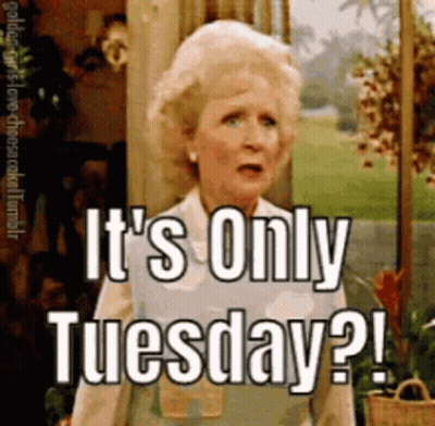 A Woman Says It 'S Only Tuesday While Standing In Front Of A Door GIF
