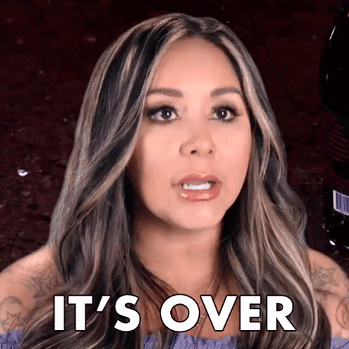A Woman Says It 'S Over In Front Of A Bottle GIF