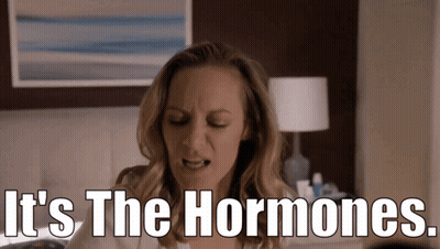 A Woman Says It 'S The Hormones In Front Of A Bed GIF