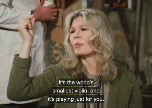A Woman Says It 'S The World 'S Smallest Violin And It 'S Playing Just For You .. GIF