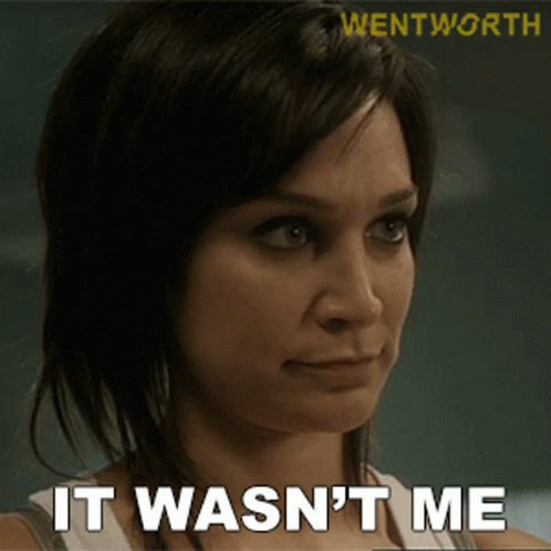 A Woman Says " It Wasn 'T Me " In Front Of A Wentworth Logo GIF