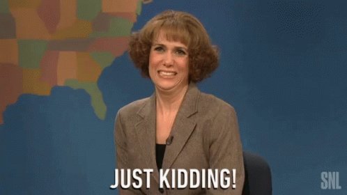 A Woman Says Just Kidding In Front Of A Map GIF