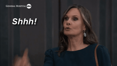 A Woman Says " Just Zip It " In Front Of A General Hospital Logo GIF