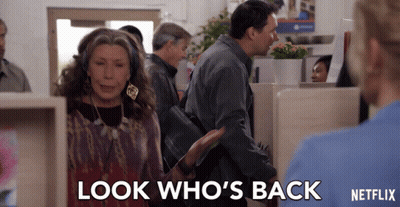 A Woman Says Look Who 'S Back While A Man Looks On GIF