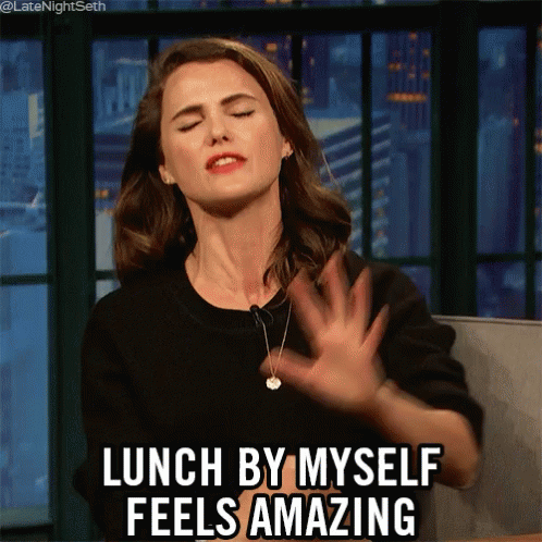 A Woman Says Lunch By Myself Feels Amazing With Her Hands Up GIF