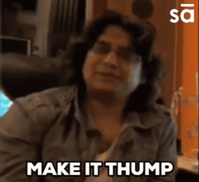 A Woman Says " Make It Thump " In Front Of A Computer GIF