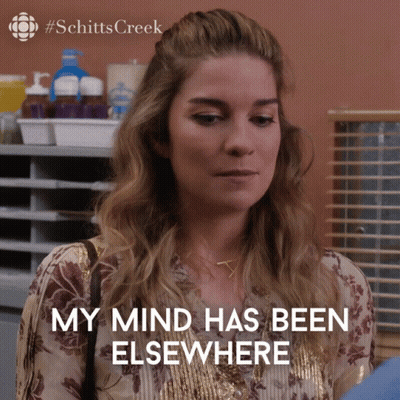 A Woman Says " My Mind Has Been Elsewhere " In Front Of A #Schitts Creek Logo GIF