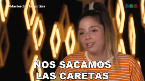 A Woman Says Nos Sacamos Las Caretas On A Screen GIF