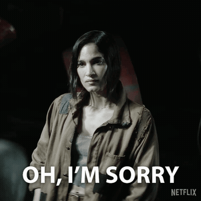 A Woman Says Oh I 'M Sorry In A Black And White Photo GIF