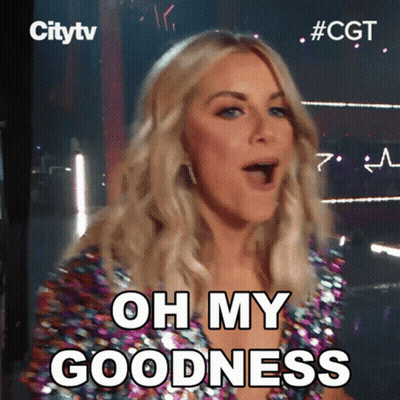 A Woman Says Oh My Goodness With Her Mouth Wide Open GIF