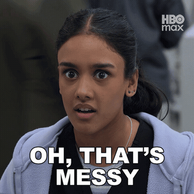 A Woman Says Oh That 'S Messy While Wearing A Hoodie GIF