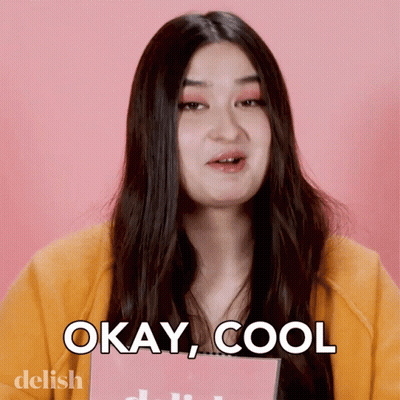 A Woman Says " Okay Cool " While Holding A Book GIF