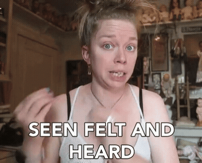 A Woman Says Seen Felt And Heard In Front Of Dolls GIF