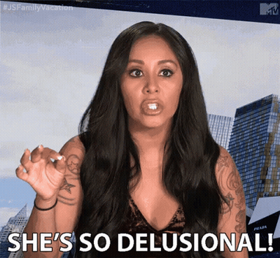 A Woman Says She 'S So Delusional In Front Of A Building GIF