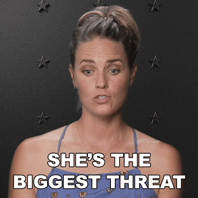 A Woman Says She 'S The Biggest Threat In Front Of A Black Background With Stars GIF