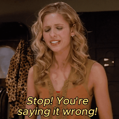 A Woman Says " Stop You 'Re Saying It Wrong " In Yellow Letters GIF