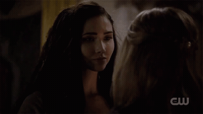 A Woman Says " Thank You Talon " To Another Woman In A Dark Room GIF