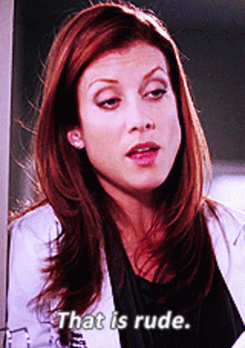 A Woman Says That Is Rude In Front Of A Window GIF