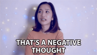 A Woman Says That 'S A Negative Thought While Standing In Front Of A Wall GIF