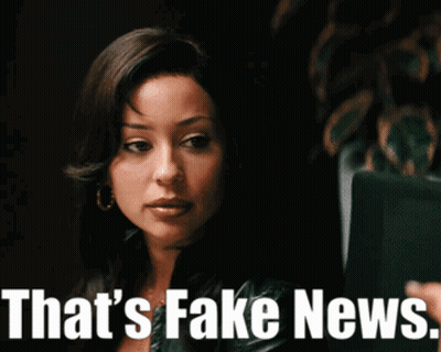 A Woman Says " That 'S Fake News " While Looking At Something GIF