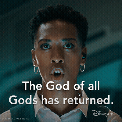 A Woman Says " The God Of All Gods Has Returned " In A Dark Room GIF