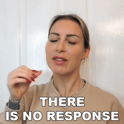 A Woman Says There Is No Response While Holding A Napkin GIF