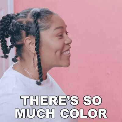 A Woman Says There 'S So Much Color In A Pink Background GIF