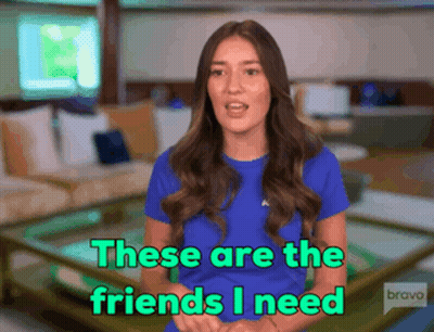 A Woman Says " These Are The Friends I Need " In A Living Room GIF