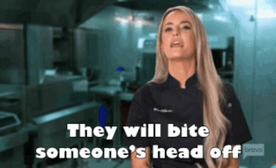 A Woman Says " They Will Bite Someone 'S Head Off " In A Kitchen GIF