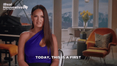 A Woman Says Today This Is A First In Front Of A Real Housewives Logo GIF