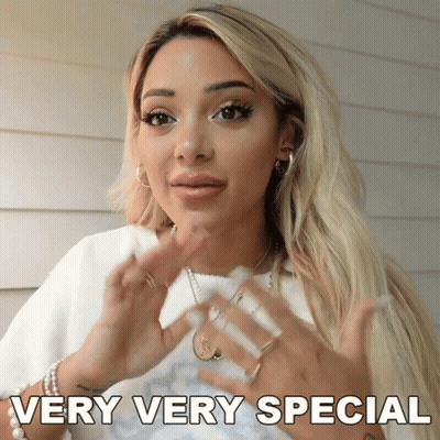 A Woman Says " Very Very Special " With Her Hands In Front Of Her Face GIF