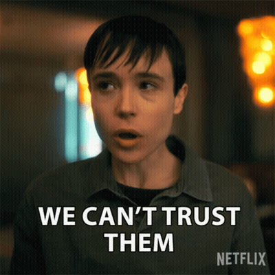 A Woman Says We Can 'T Trust Them With A Netflix Logo Behind Her GIF