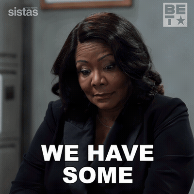 A Woman Says " We Have Some " While Wearing A Suit GIF