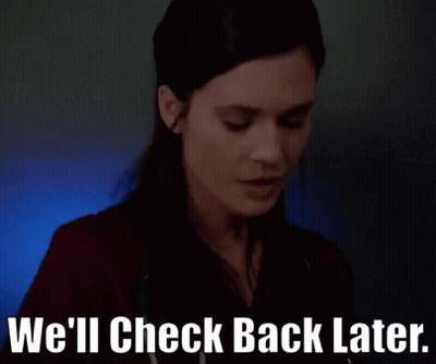 A Woman Says " We 'Ll Check Back Later " While Smiling GIF