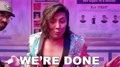 A Woman Says We 'Re Done In Front Of A Poster About Strokes GIF