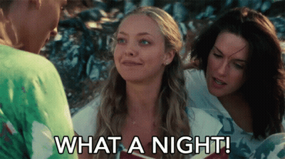 A Woman Says " What A Night " While Talking To Two Other Women GIF