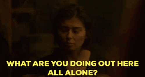 A Woman Says " What Are You Doing Out Here All Alone " In A Dark Room GIF