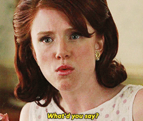 A Woman Says " What 'D You Say " While Looking At The Camera GIF