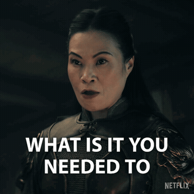 A Woman Says What Is It You Needed To In A Dark Room GIF