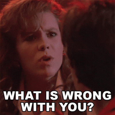A Woman Says " What Is Wrong With You " While Looking At The Camera GIF