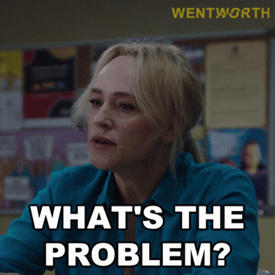 A Woman Says What 'S The Problem In Front Of A Wentworth Sign GIF